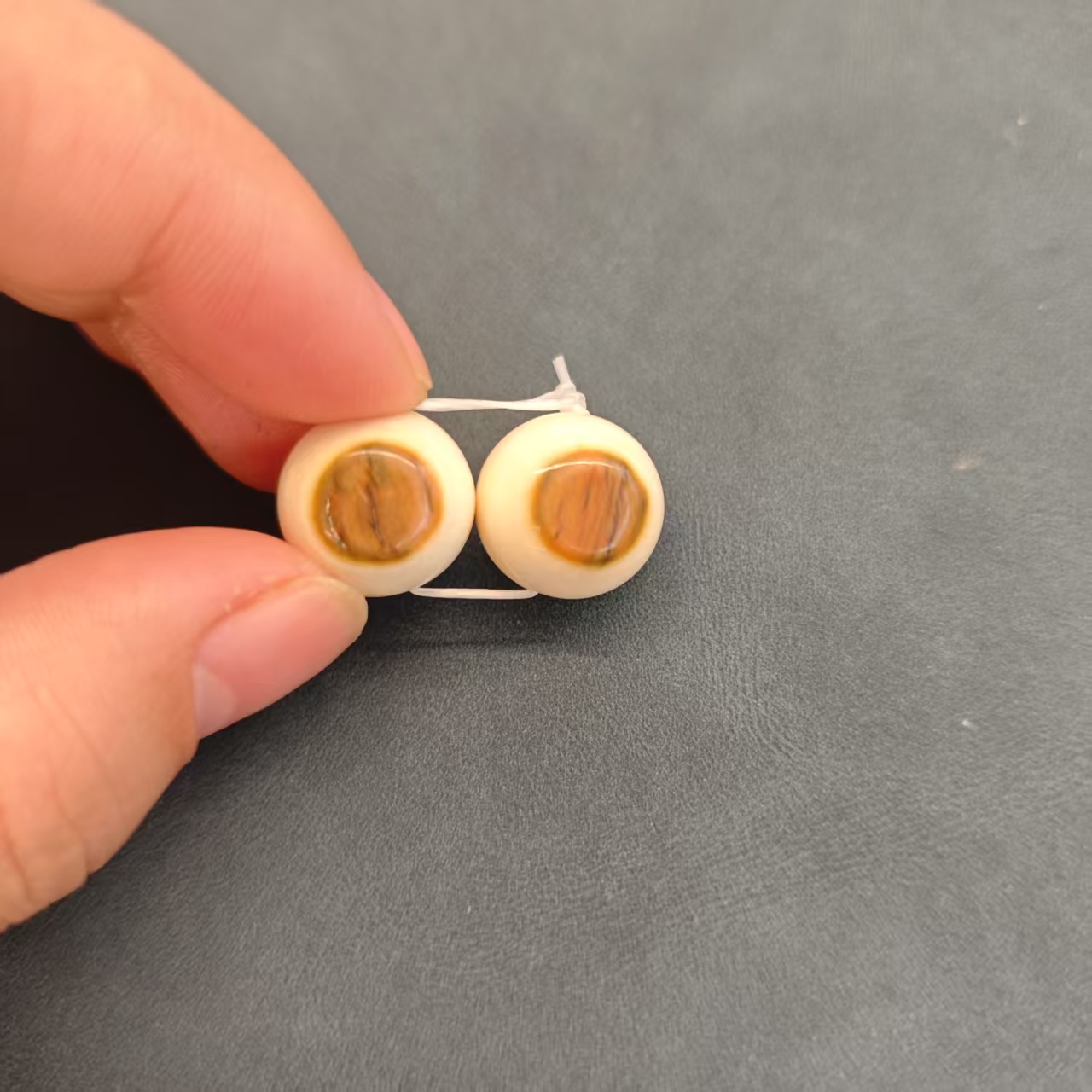 A00089一对腰珠猛犸牙配饰