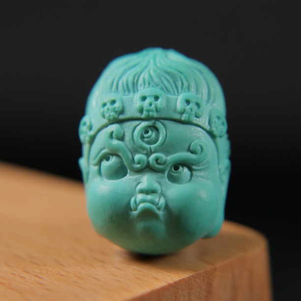 原矿绿松石黑小天佛首 尺寸16×22.3×13.8mm，重7.15g