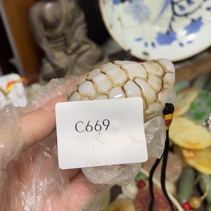牛***2瓷片c669工艺品店