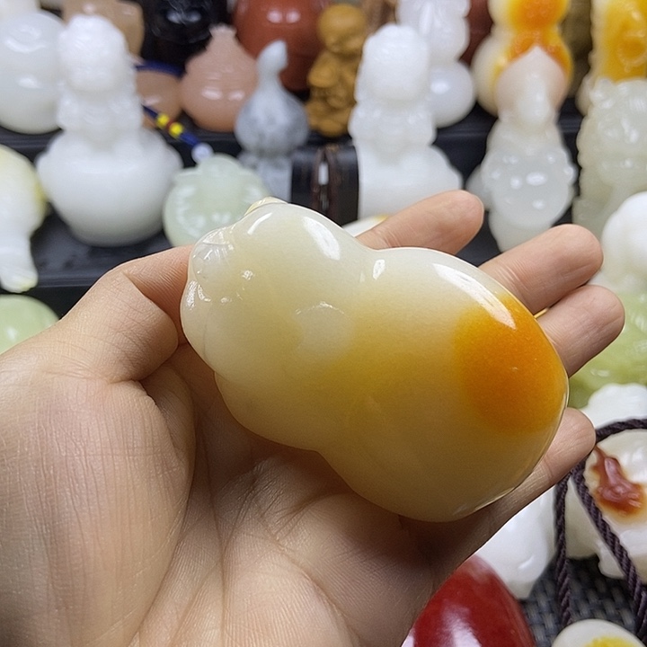 无花朵原石手把件