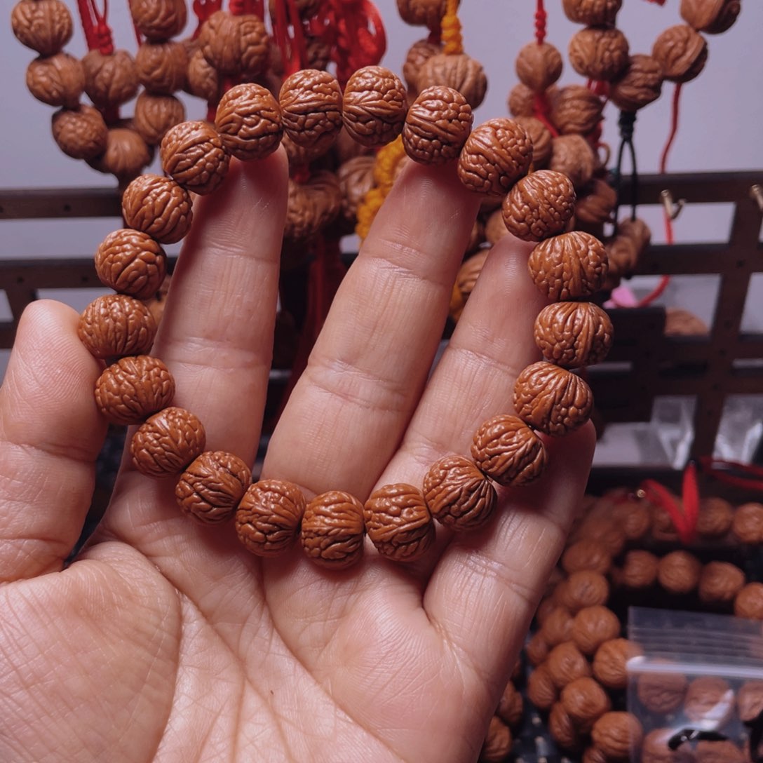 木质类龙纹桃枭手串