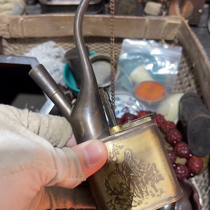 知***7陶黄铜水烟袋等产品的生产和销售