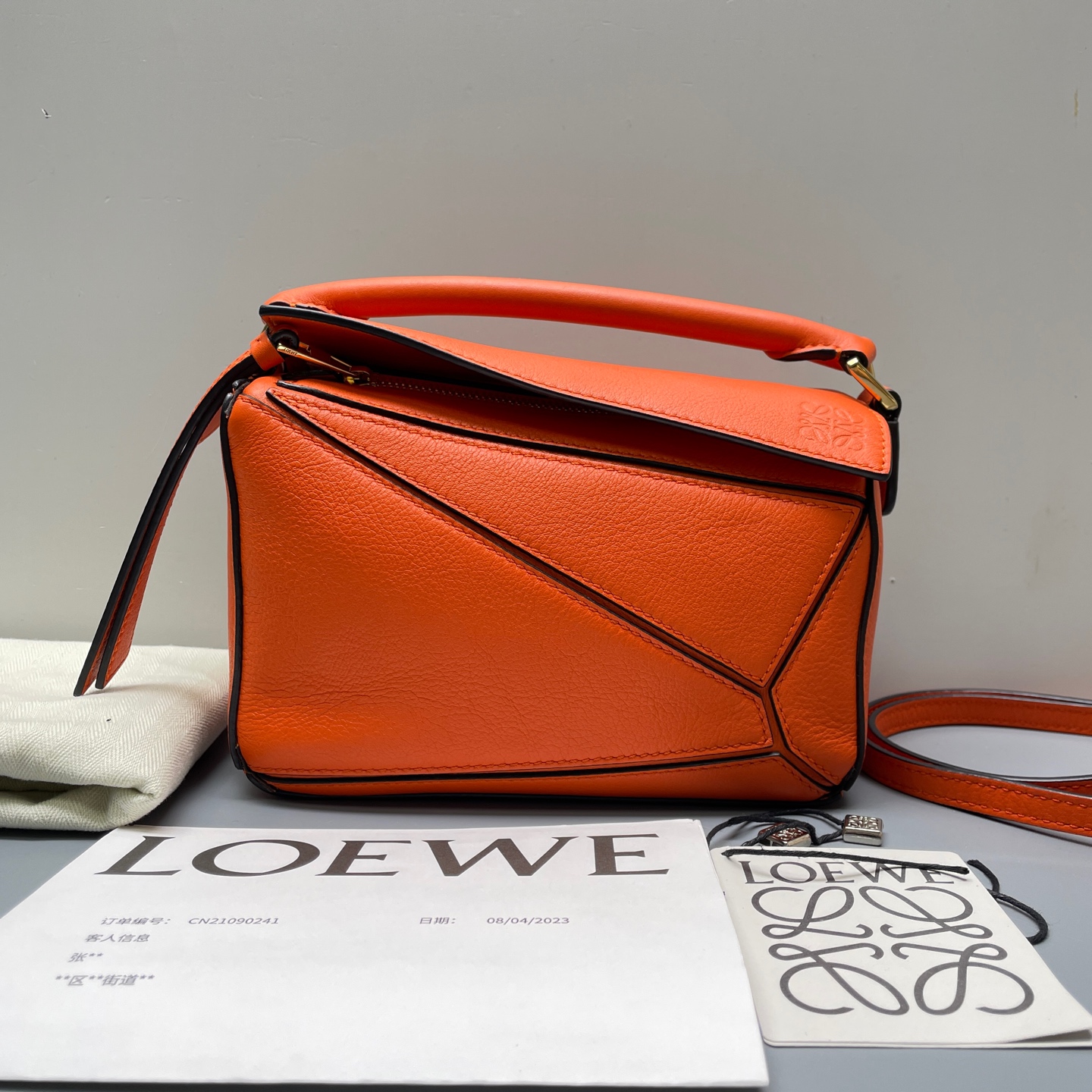 95新 LOEWE/罗意威 优选/Puzzle迷你橙色几何包22年带票/18×11×8