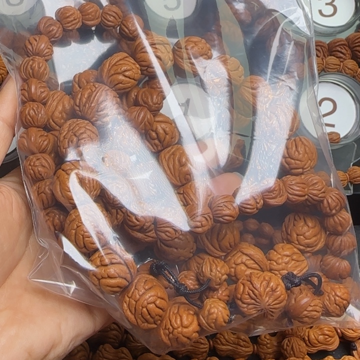 和***起桃核手串龙纹桃核