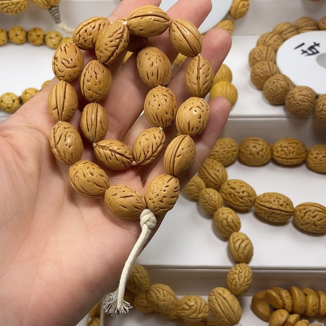 留***命东北脑纹桃核11加钱袋子
