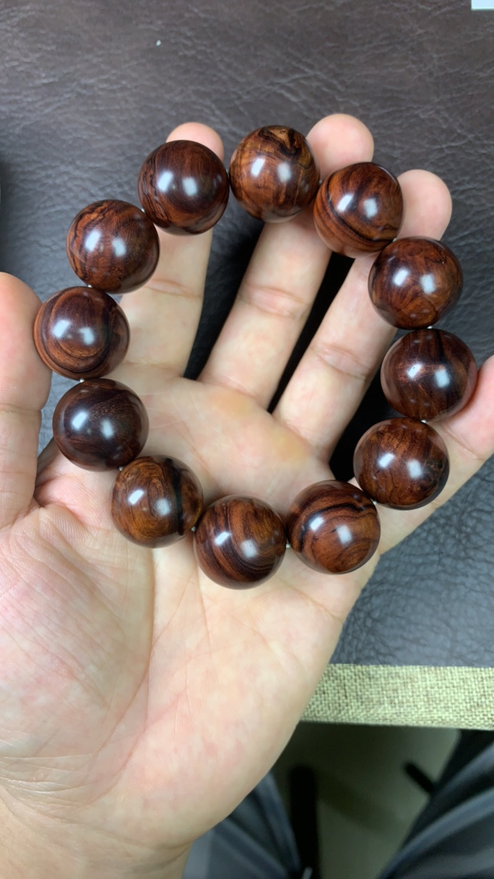 海南黄花梨彩料留疤水波50.3克2.0