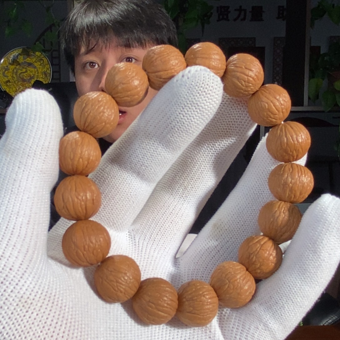 刘***注手串猴头核桃14三维同尺全品无暇凤羽