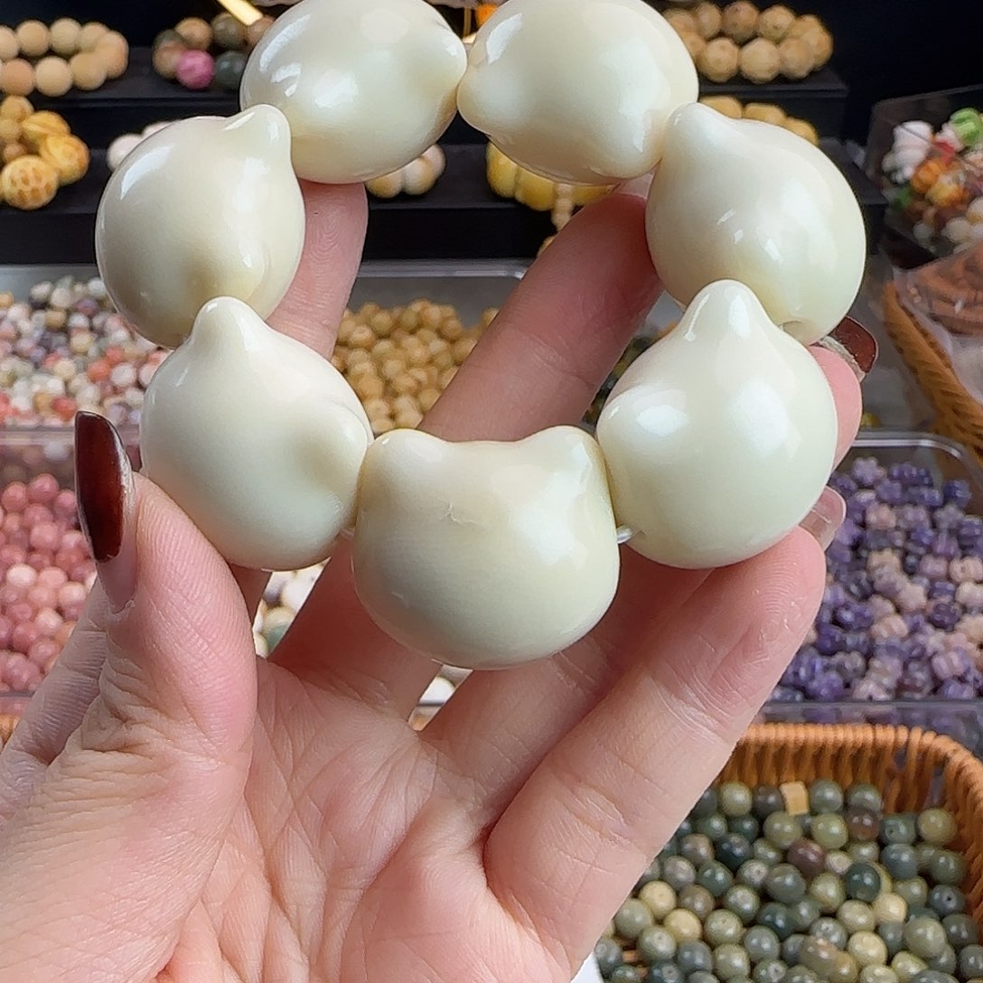 手串菩提根/象牙果微瑕牙果卡27大猫头手捻1个