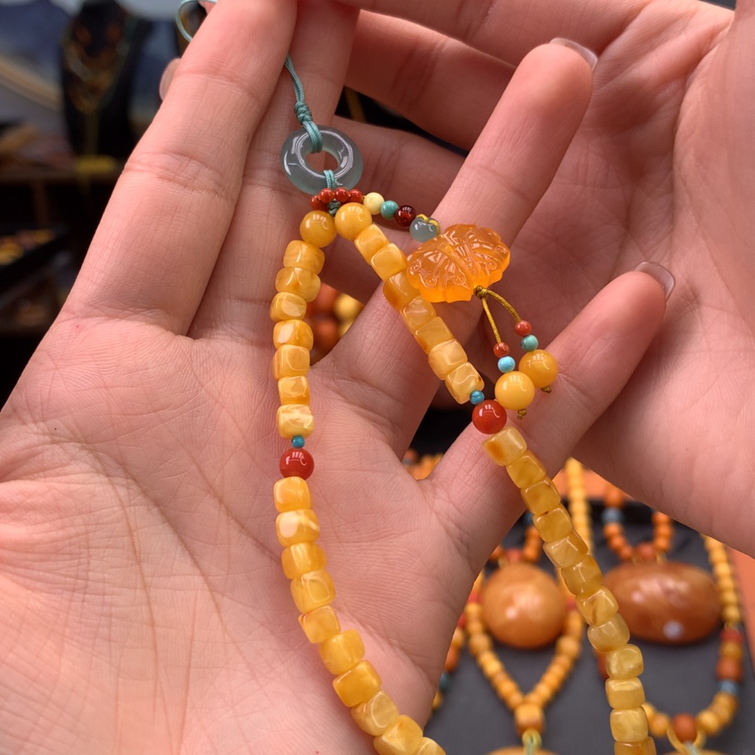 蜜蜡裸石未镶嵌手机挂件多样性发