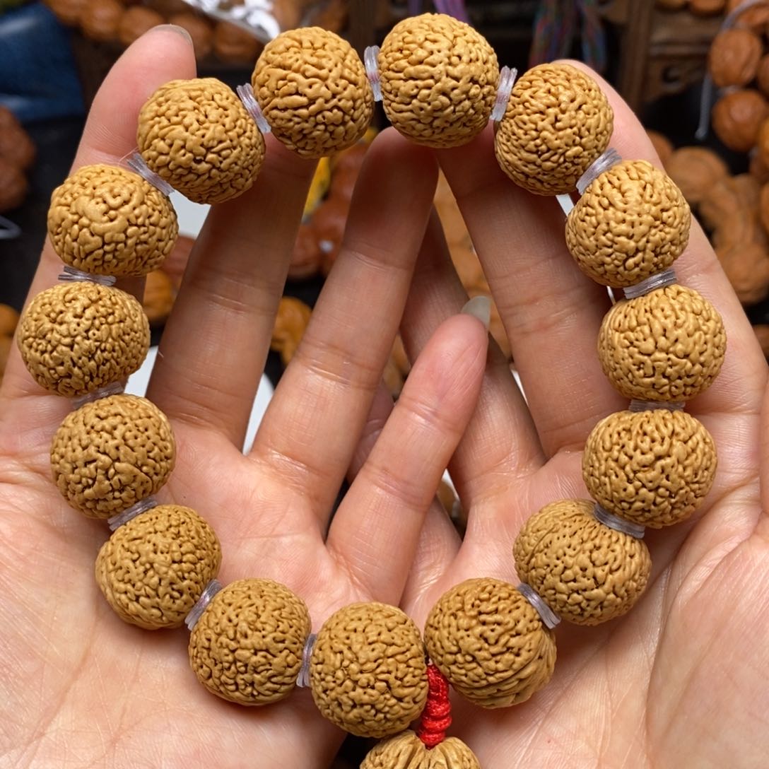 桃核手串龙鳞凤尾