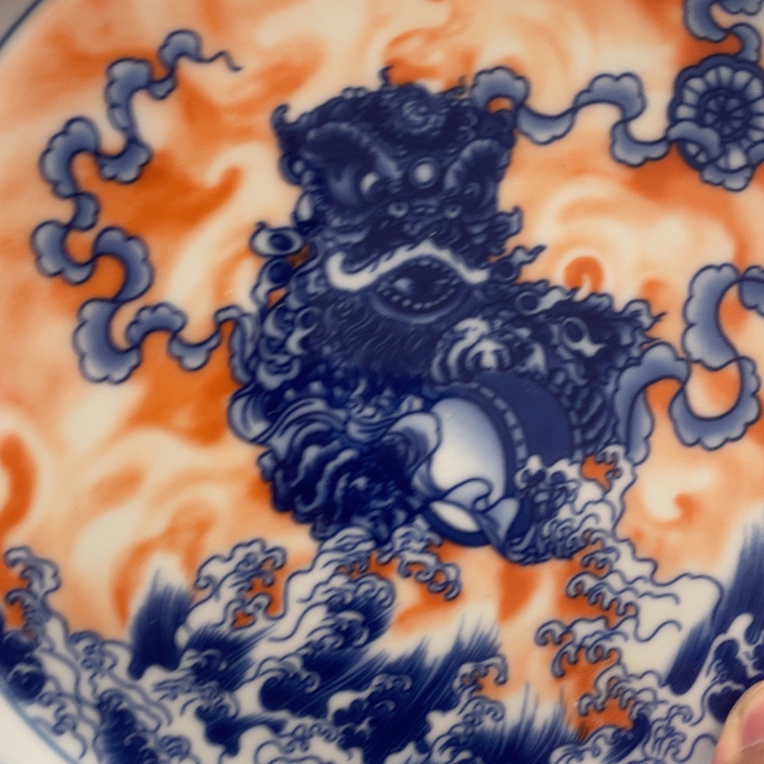 瓷片泛红狮子大壶承