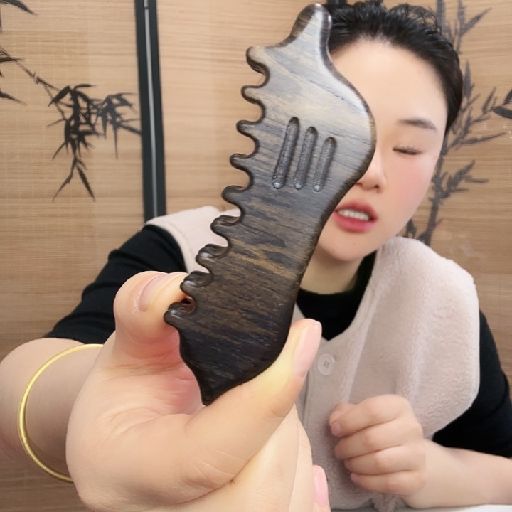 紫光檀小号脸梳微瑕