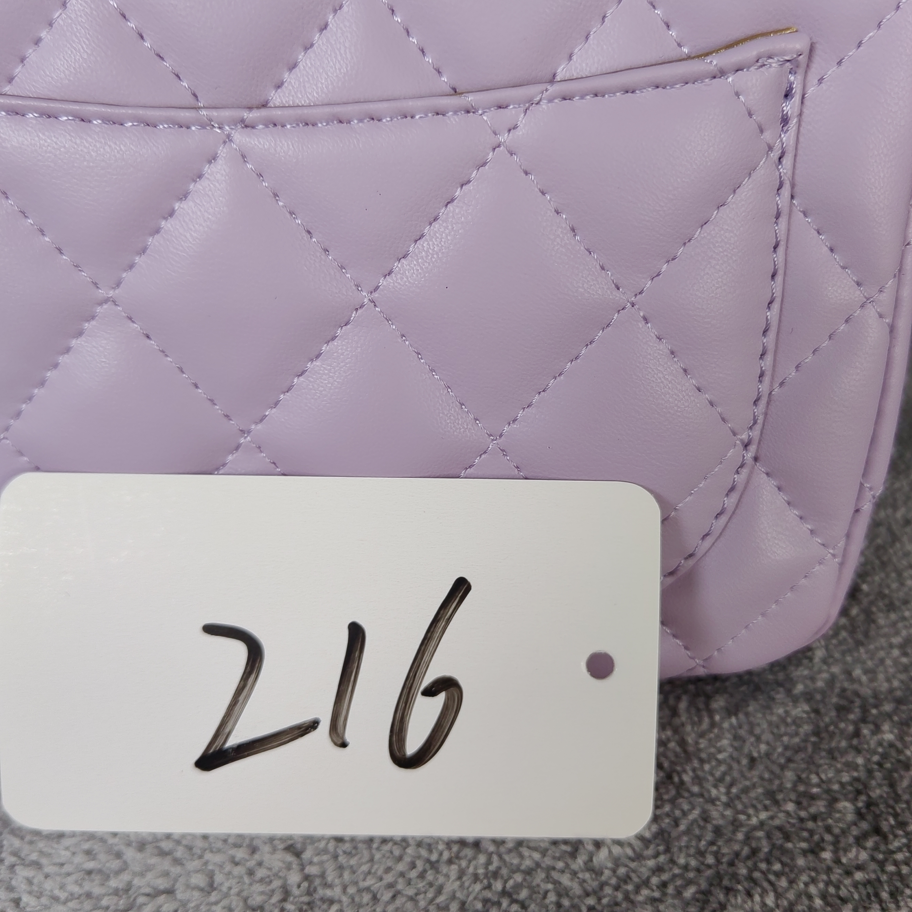 216紫色金扣金球长胖子咩咩包包