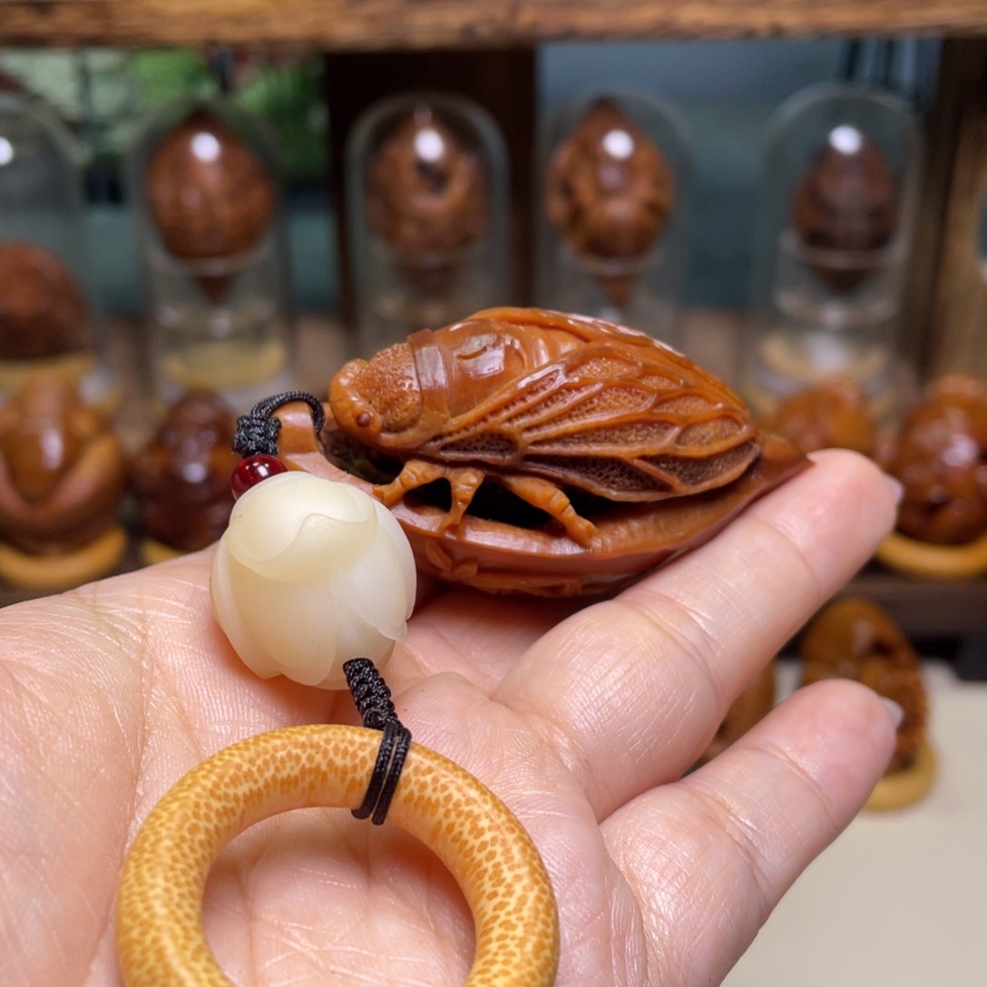 橄榄核吊坠一鸣惊人手把