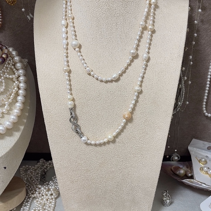 淡水珍珠银S925镶嵌耳饰