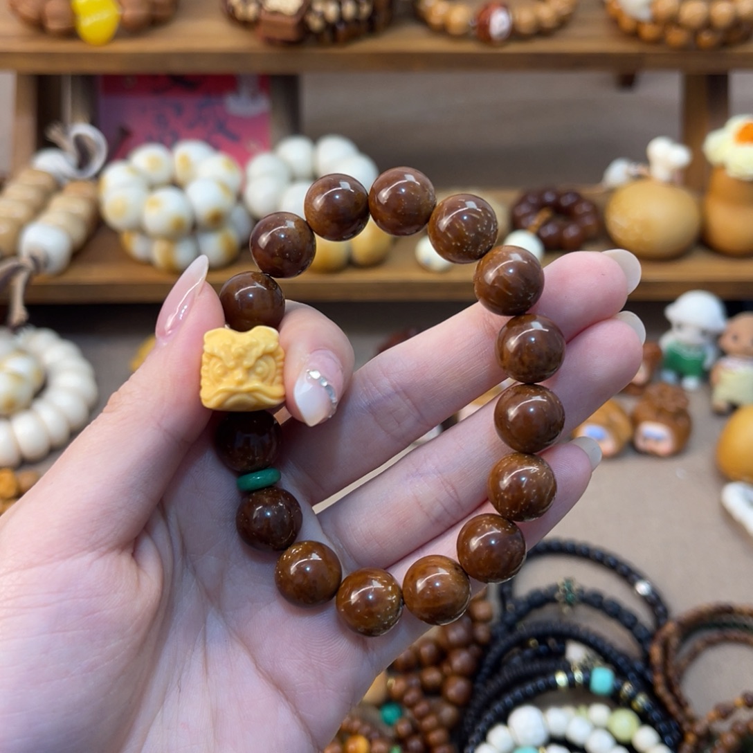 李***天库克手串圆珠搭配醒狮