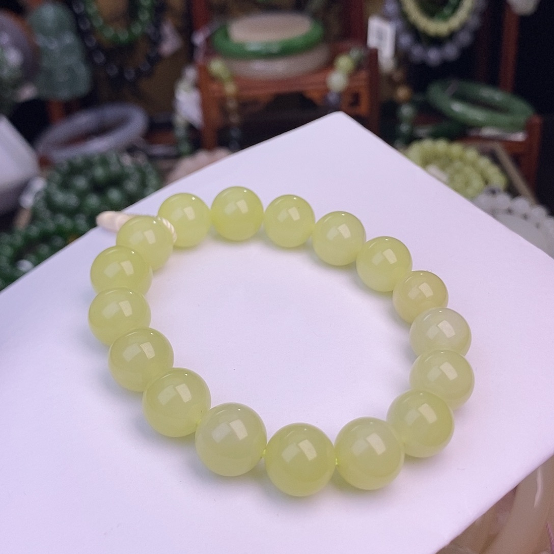 和田玉未镶嵌若羌鸡油黄手串卡约12m m