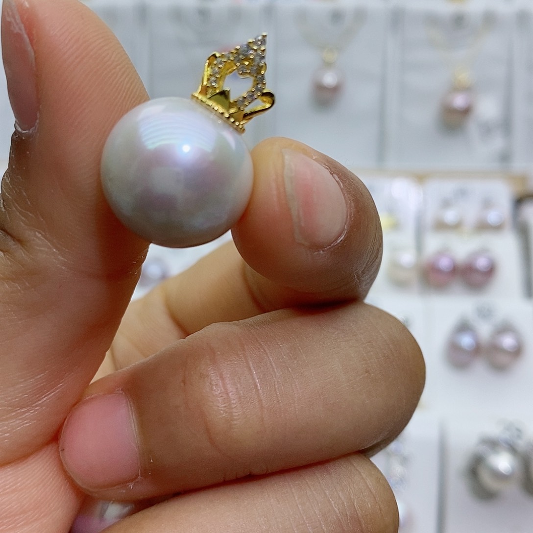 淡水珍珠银S925镶嵌吊坠(赠链)曼**贸