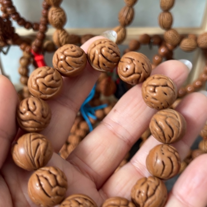 ╰***ゝ精品桃枭正圆手串