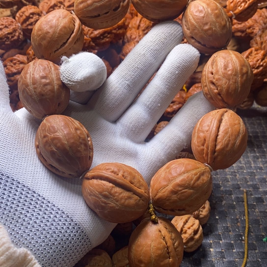 郑***吊坠文玩核桃恐龙蛋