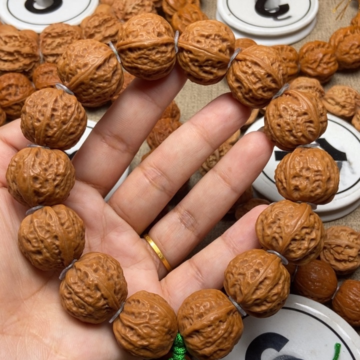 文玩核桃吊坠密纹元宝