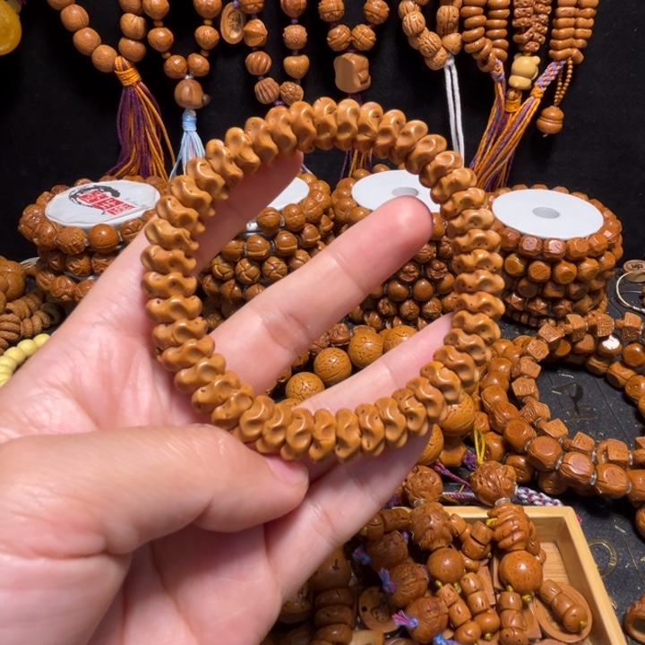 用***3桃核手串瑕疵龙骨手串