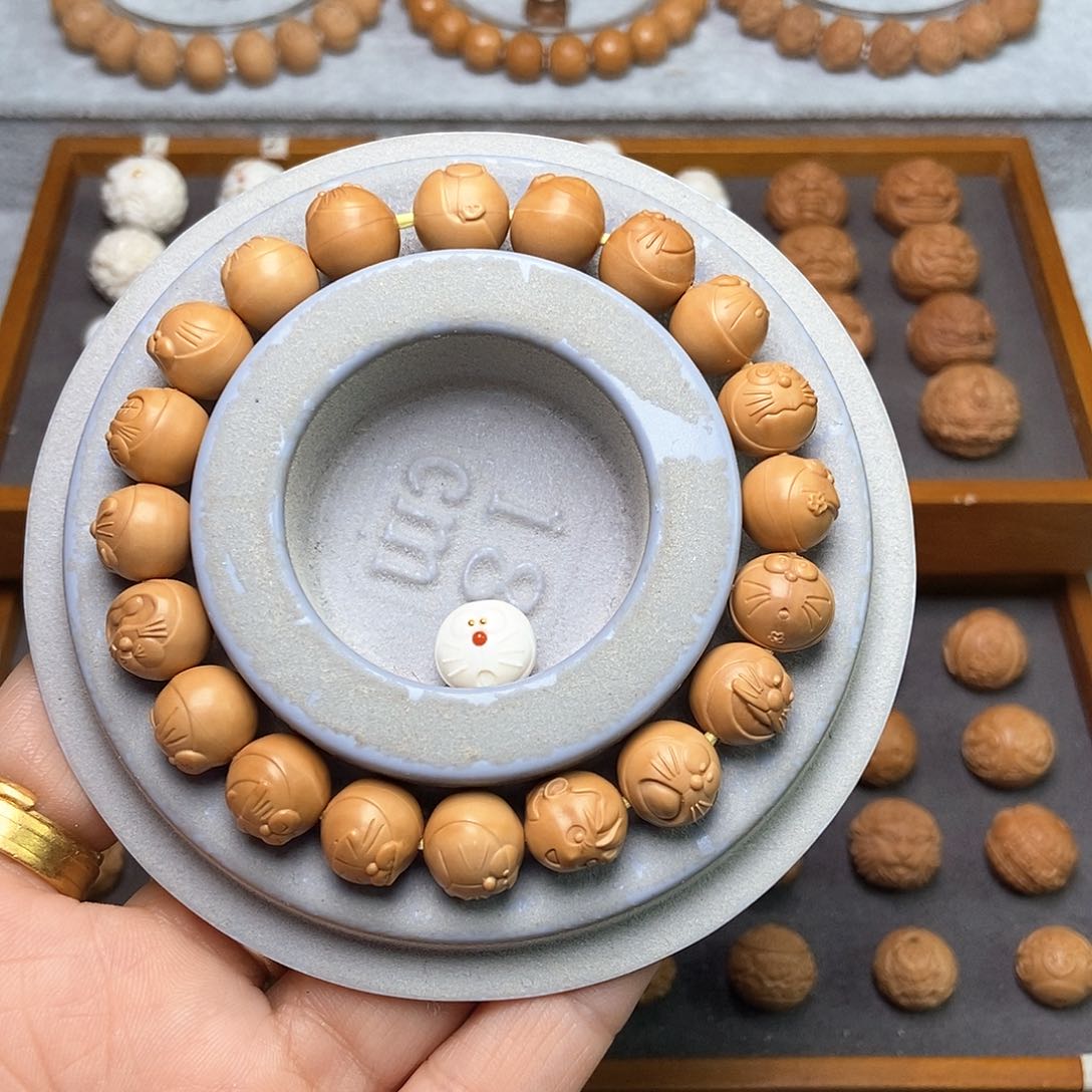 猴头核桃手串豆**豆瑕疵多啦串 猛犸多啦镶嵌金眼南红铃铛