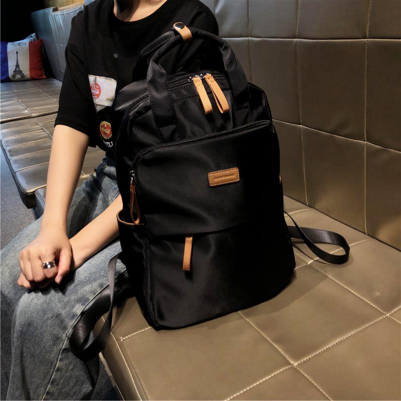 双肩包女2024新款大容量轻便旅行背包通勤运动男士书包潮