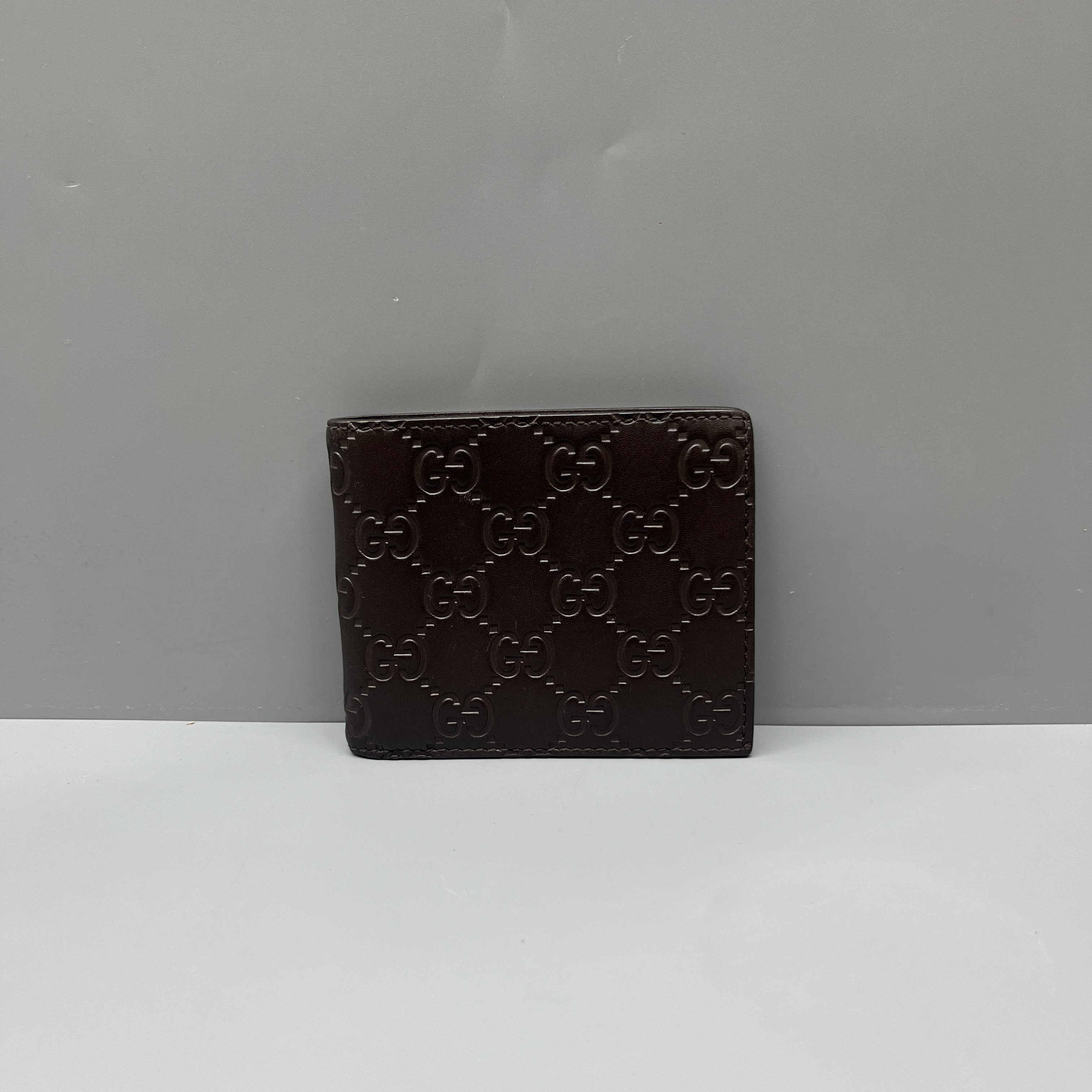 95新 GUCCI/古驰 棕色压花短款对折钱包 尺寸11*9 SV16674