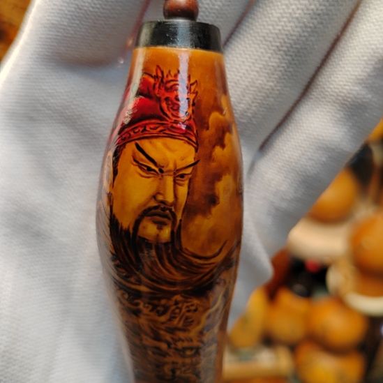 曾***经葫芦随型设计手把件