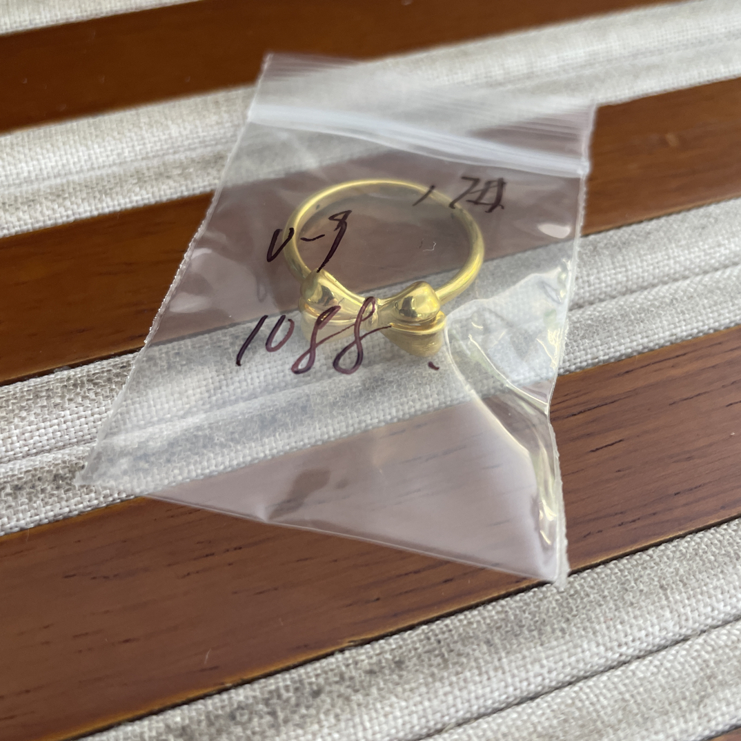 克重0.9 17号 蝴蝶结戒指 足金999