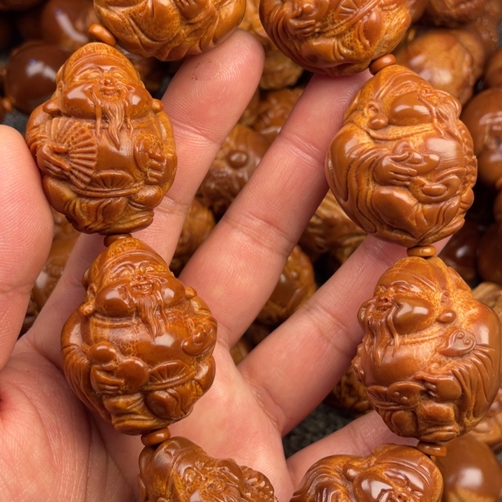 橄榄核吊坠?****?橄榄核手持