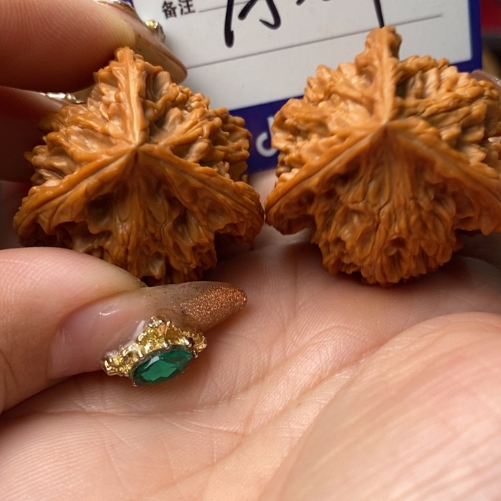 李***子把件桃核三棱三棱