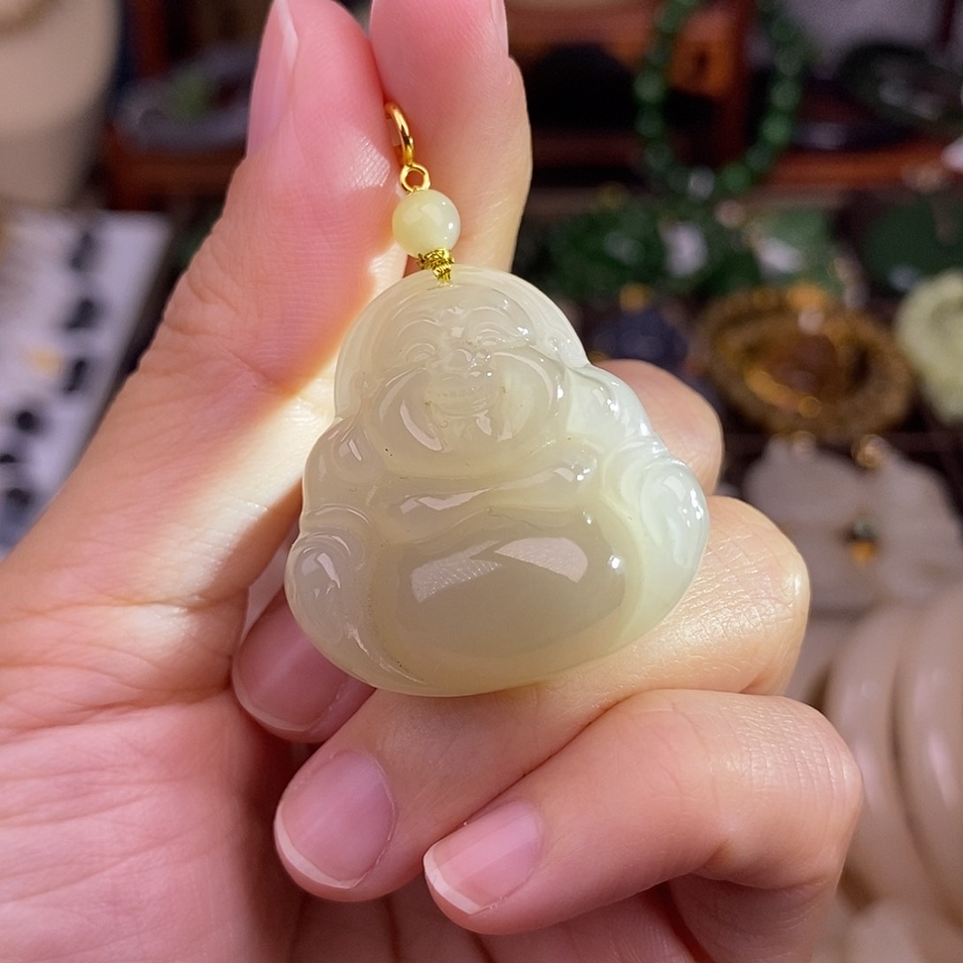 和田玉熟藕粉浓色18.K金清货价佛公未镶嵌