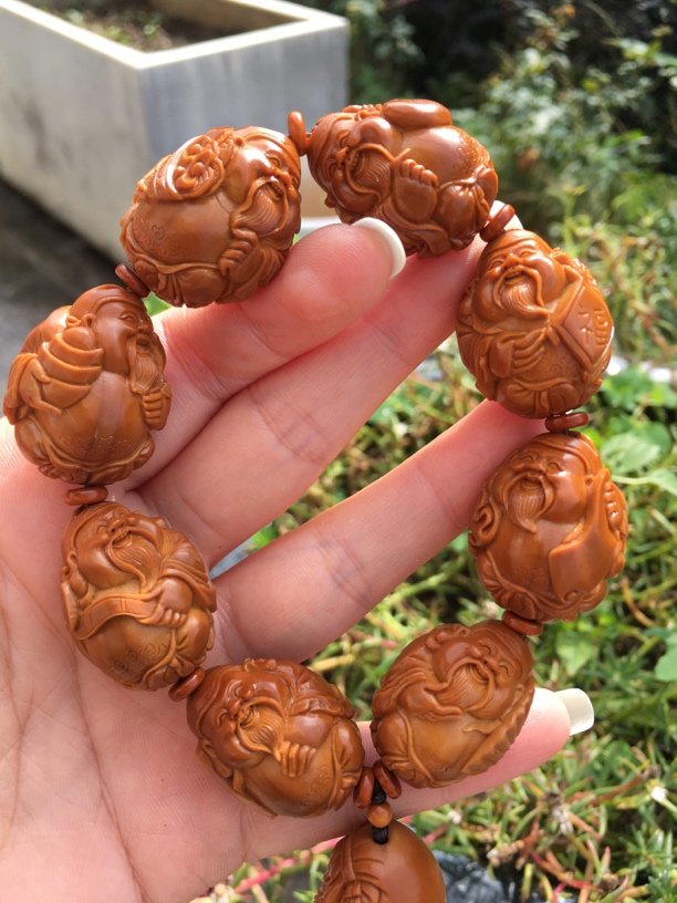 橄榄核财神王忠明