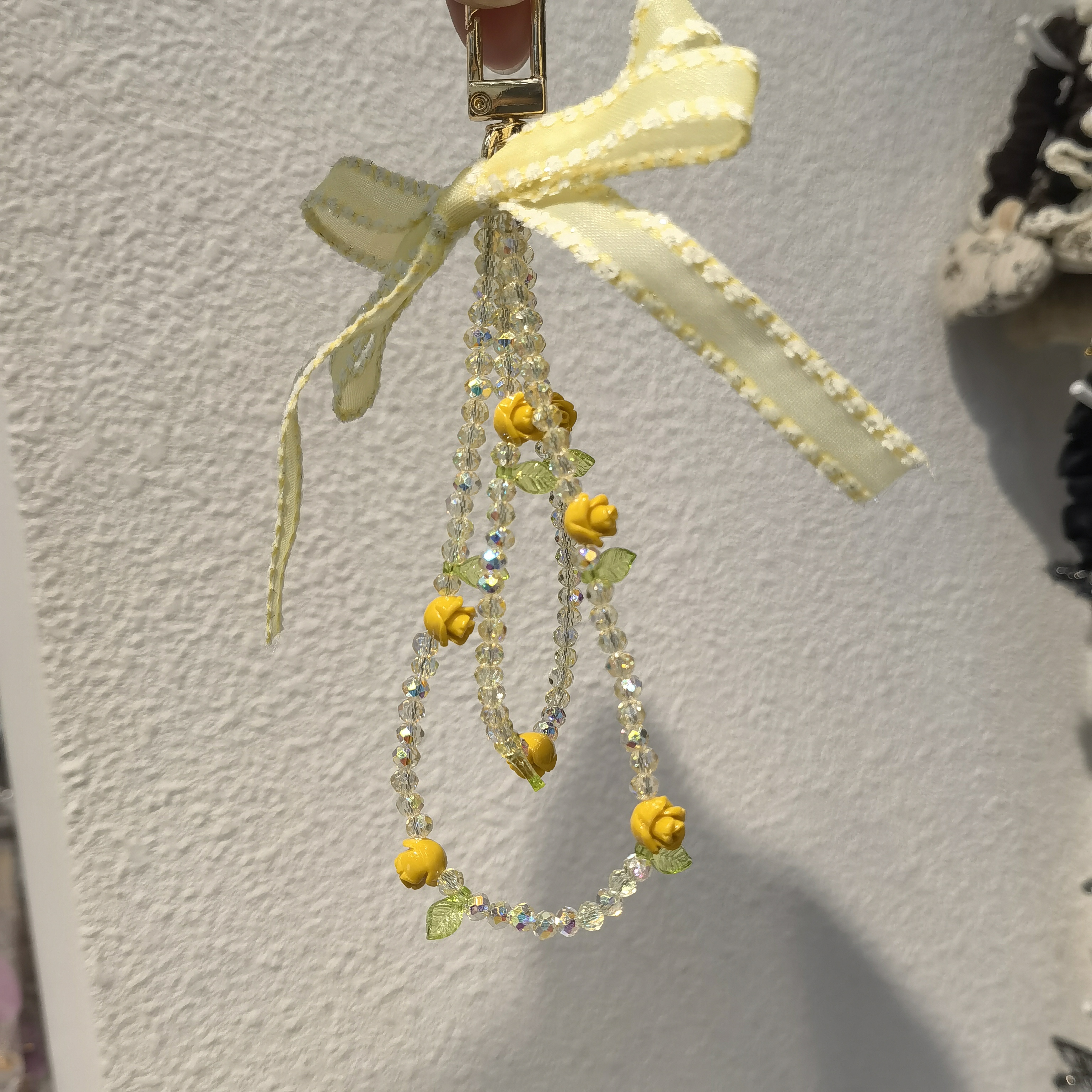 A220黄色蝴蝶结水水花朵手机链包挂件