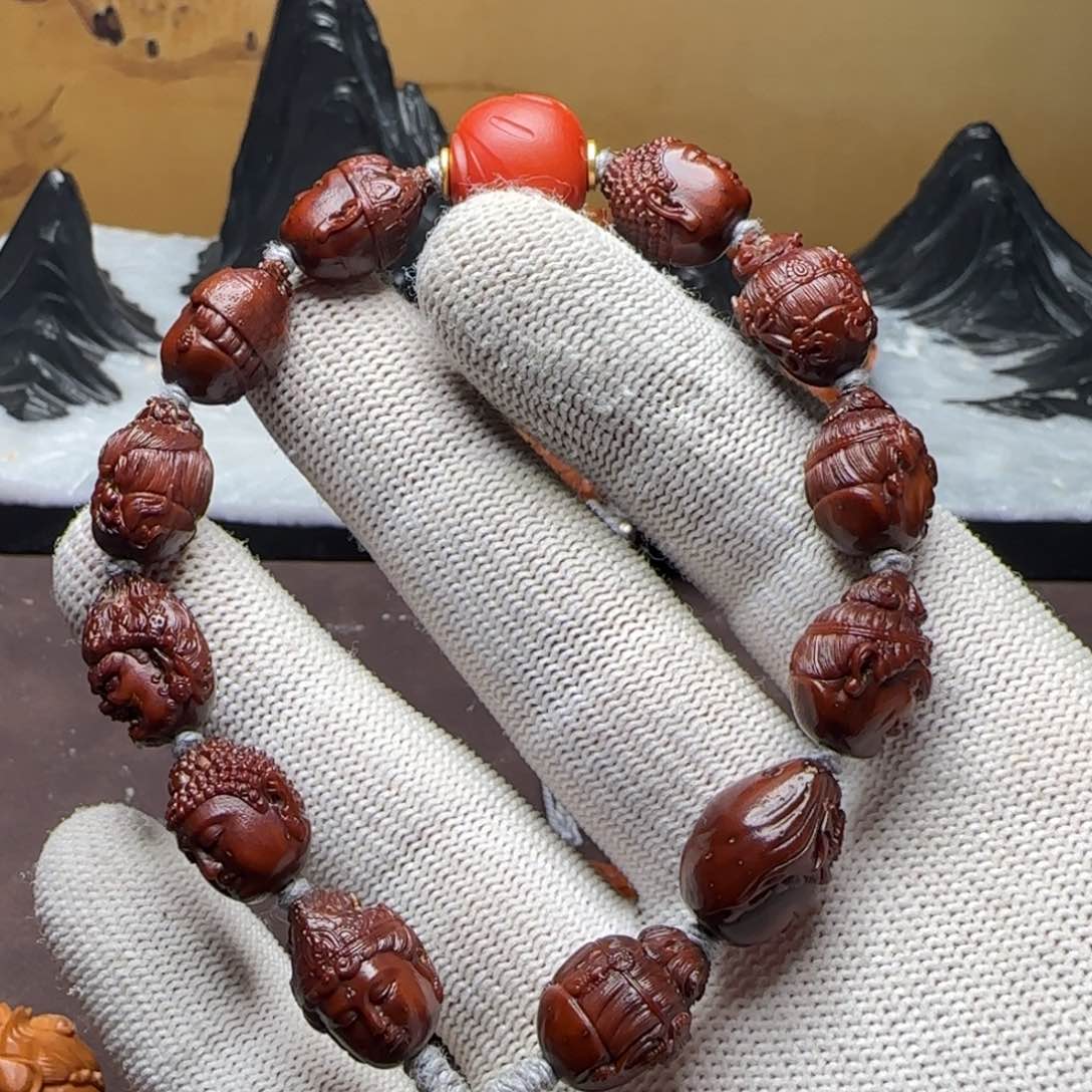 橄榄核手串/手链s*y紫金鼠万佛头手串