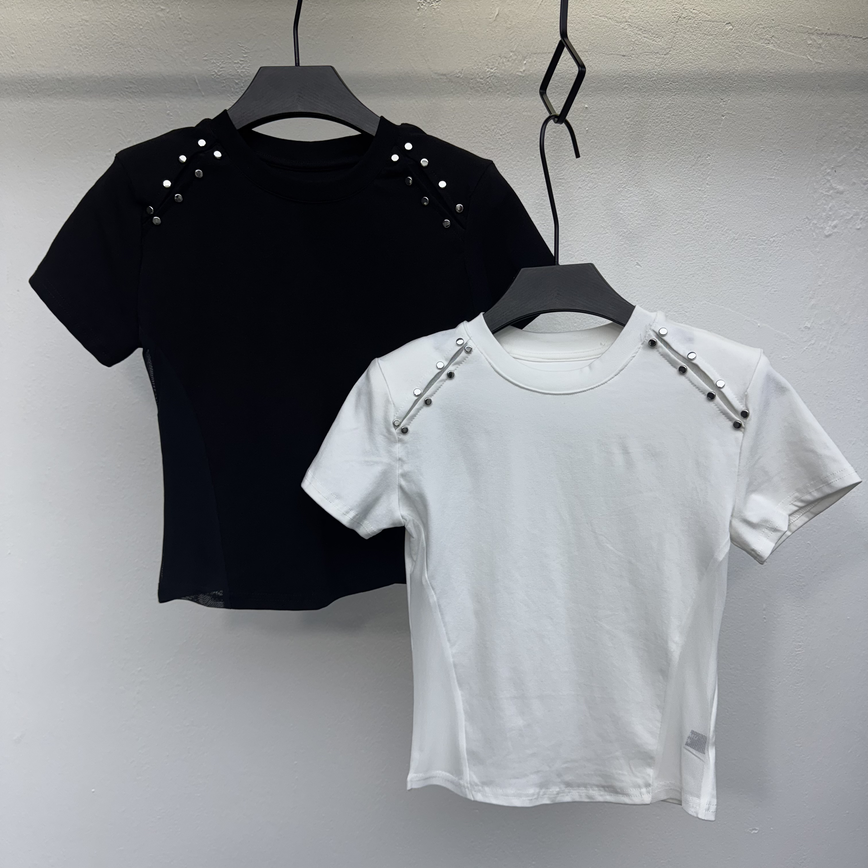 柳丁拼接网纱款垫肩女时尚短袖25033