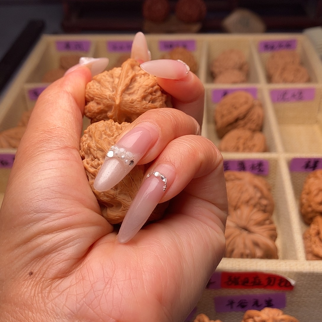 橙***9把件文玩核桃沈阳鸡心