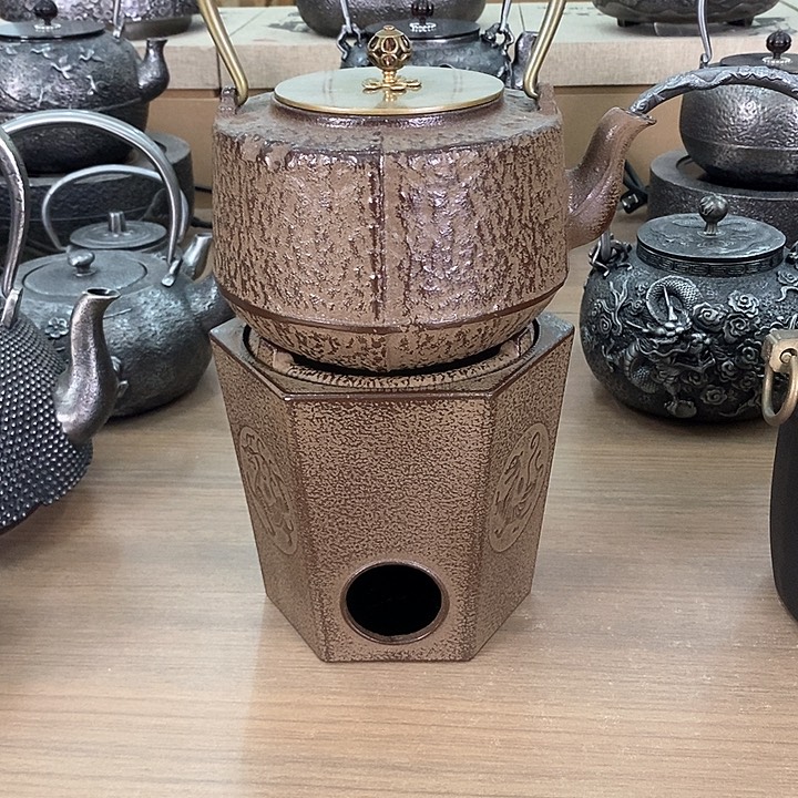1六角碳炉+补盯铸铁壶1200毫升