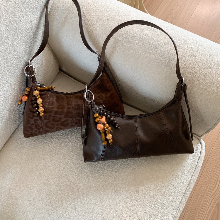 美拉德复古腋下包包女2025新款潮时尚韩国新月包简约手提通勤包