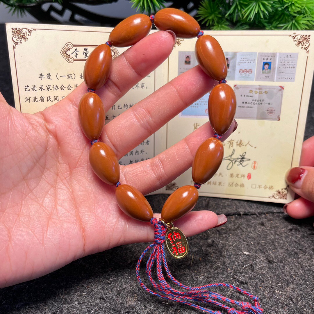 相思豆手工打底镜面高抛橄榄核铁核素串小手串