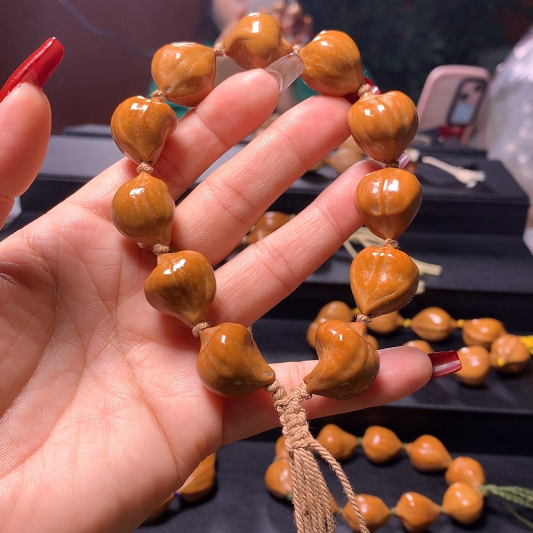 橄榄核手串/手链一****?三花手串