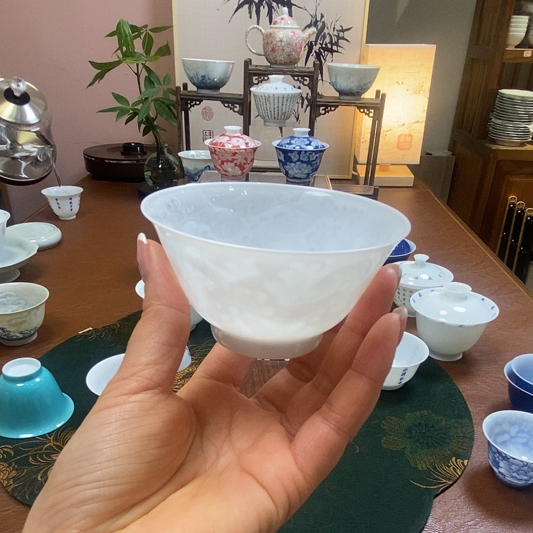 丽****房脱胎瓷高温手工超薄胎内模印暗刻龙腾四海单杯