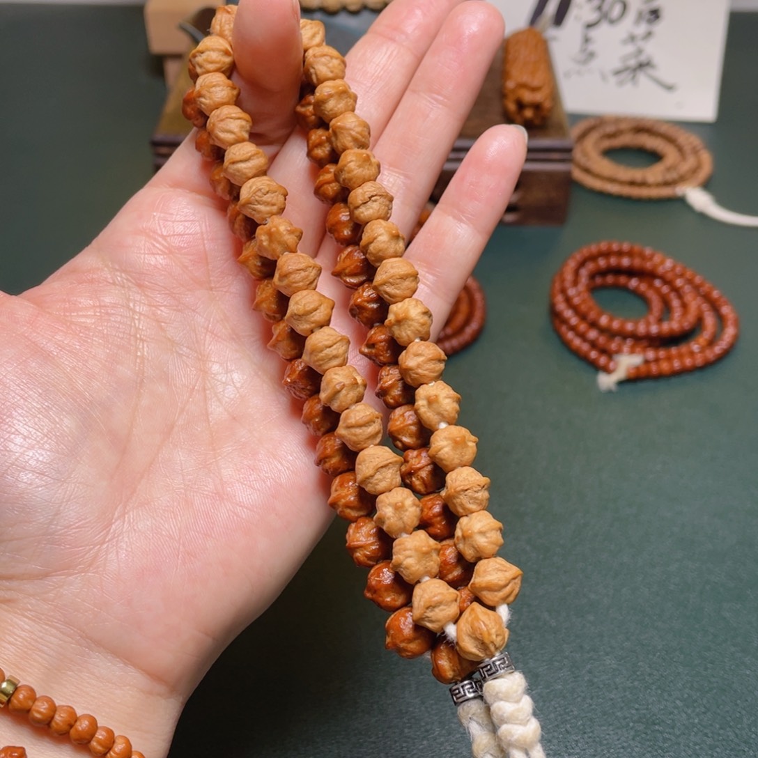 柏香籽/百香籽吊坠白牙横打手持