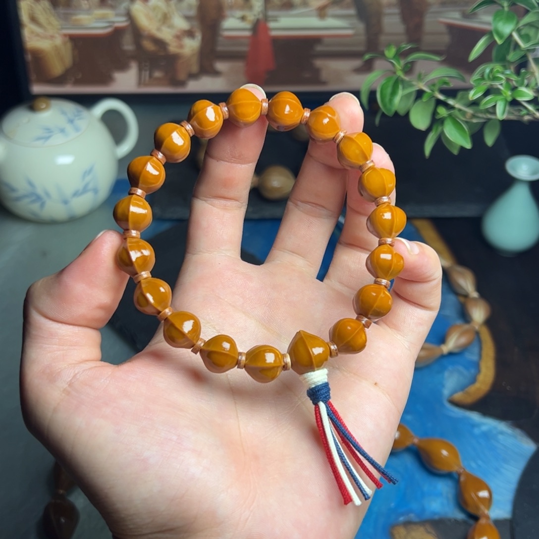 @***卷橄榄核手串/手链密桃臀水晶核1.1鲨鱼背