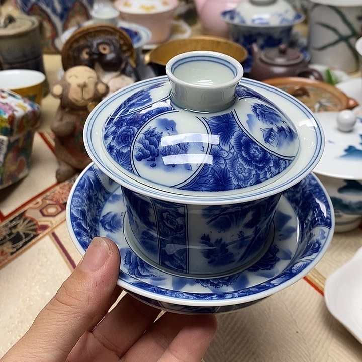 紫砂茶盘杯子的味道就好像被风带走啦似的