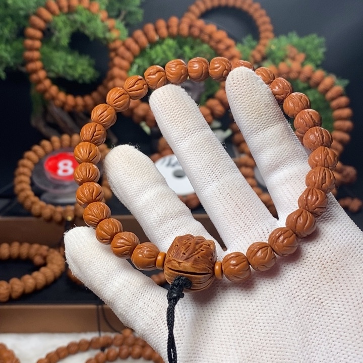 桃核吊坠可**口秦岭龙纹