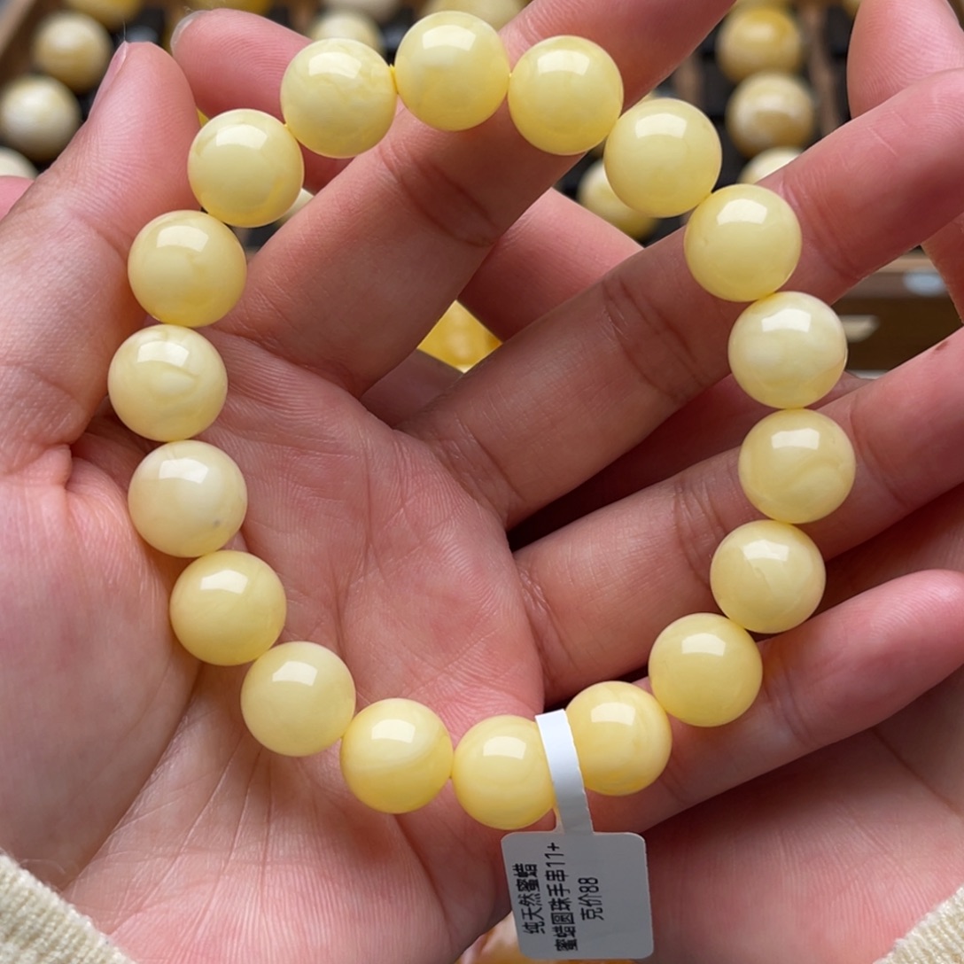 琥珀未镶嵌裸石蜜蜡手串笑