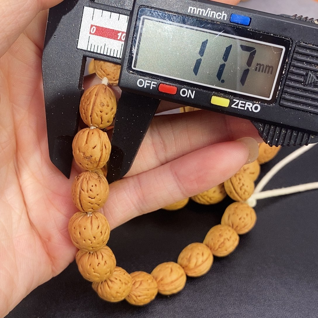 桃核吊坠小桃核手持